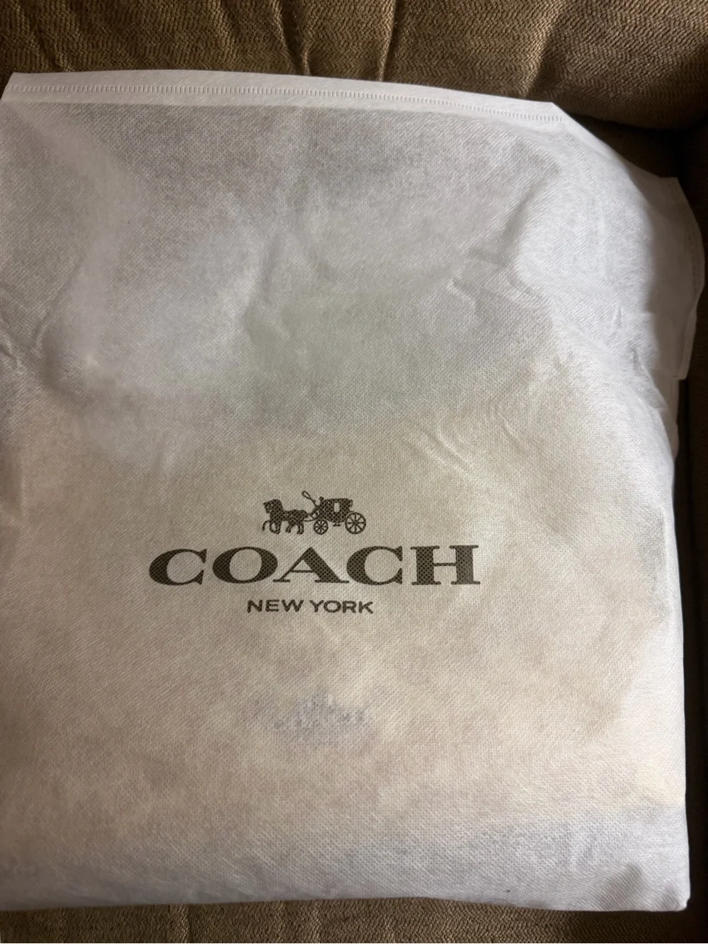 Coach Beige Signature Wristlet Clutch